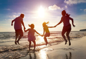 family enjoying sunset